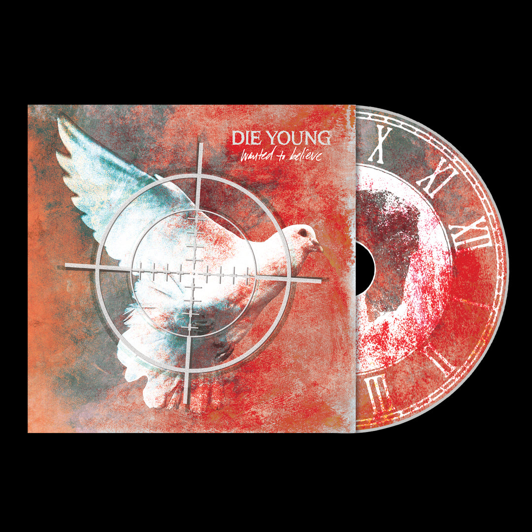 The CD cover from Die Young shows a white dove on a red textured background with a crosshair frame. DIE YOUNG Wanted To Believe is in the upper right, and the CD displays distressed clock imagery. Brand Name: Die Young.