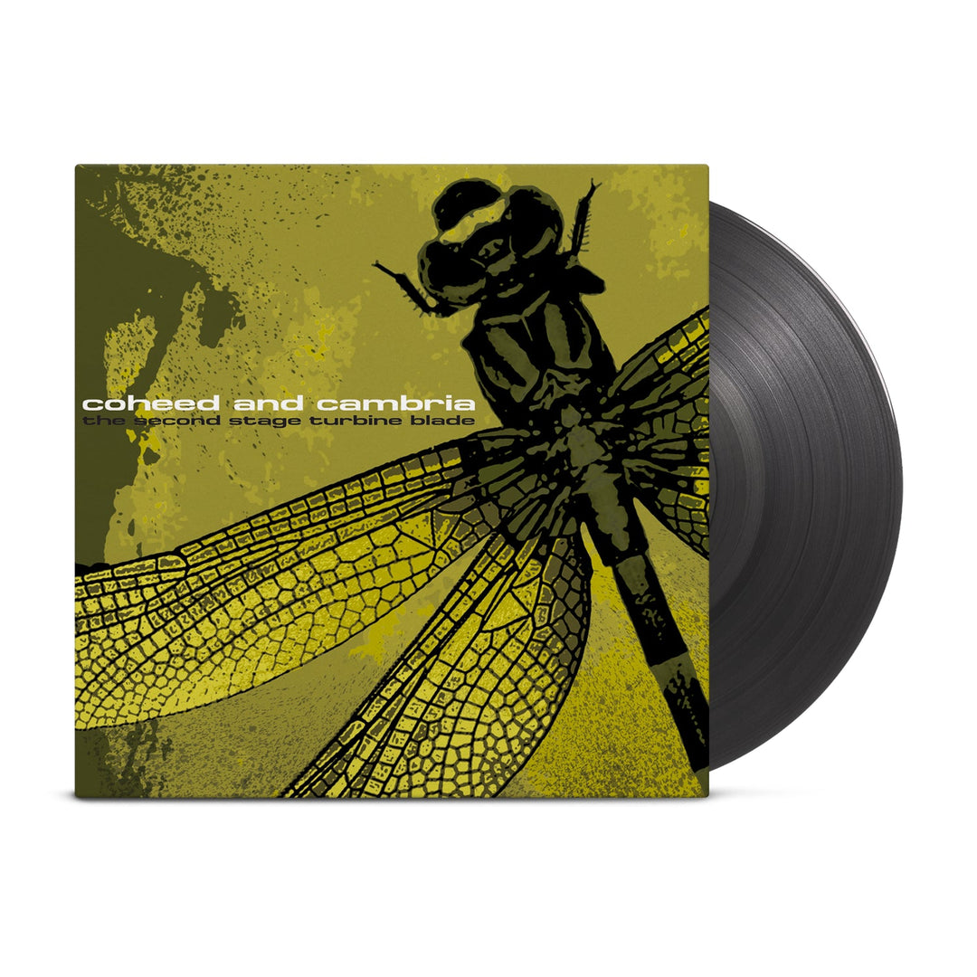 A Transparent Black Vinyl from Coheed and Cambria with a cover showing a black and yellow illustrated dragonfly. The text on the cover reads Coheed and Cambria - The Second Stage Turbine Blade.
