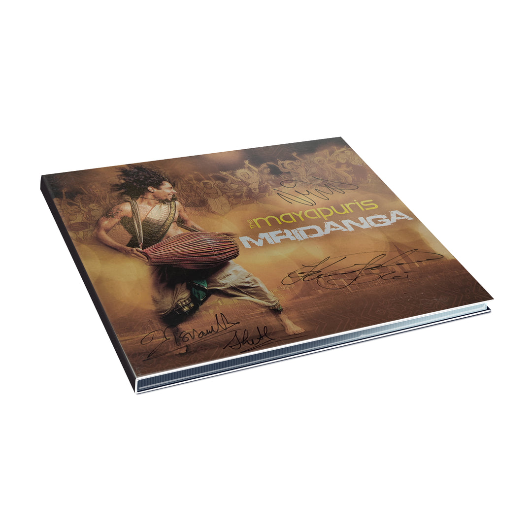 A signed Mayapuris Mridanga CD album cover featuring a person playing the traditional mridanga drum, with warm golden tones and artistic graphics capturing the vibrant spirit of world music and kirtan.