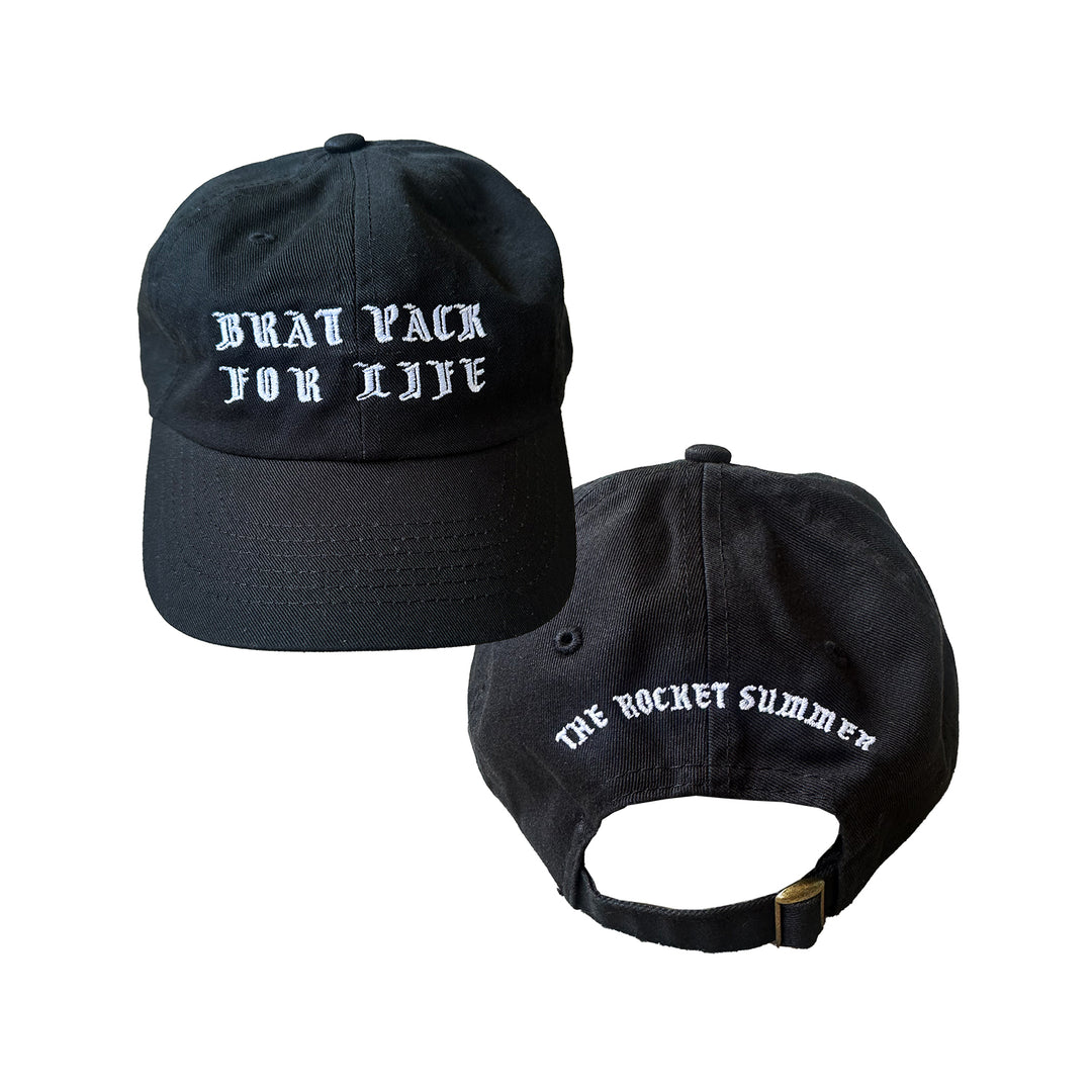 Two angles of The Rocket Summer black cotton baseball cap: the front has embroidered white BRAT PACK FOR LIFE, while the back shows THE ROCKET SUMMER above an adjustable strap. A must-have dad hat for fans.
