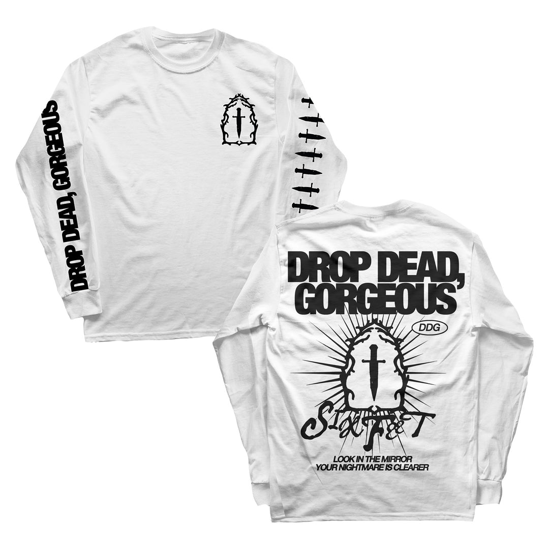 Drop Dead, Gorgeous presents a classic-fit white long-sleeve shirt in 100% cotton, featuring a bold cross-in-sunburst graphic on the front and DROP DEAD, GORGEOUS with artwork on the back. Sleeve displays DROP DEAD, GORGEOUS along its length.