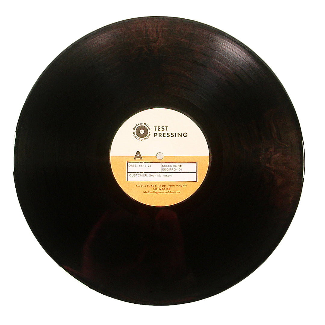 A black 12” vinyl record by Spiritkiller with a white and orange center label reading Test Pressing and track info, shown on a white background.