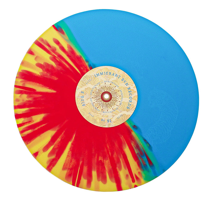 The Spiritkiller vinyl features a half solid blue, half yellow with red splatter design. It includes a gold center label with intricate text and patterns, plus an etched B-side for extra detail.