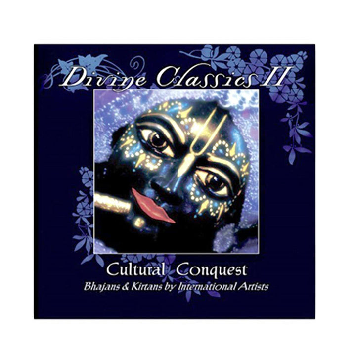Mantralogys Divine Classics: Cultural Conquest album cover features Krishna’s face with white and yellow markings on a dark blue floral background, celebrating Vaishnava Hindu music.