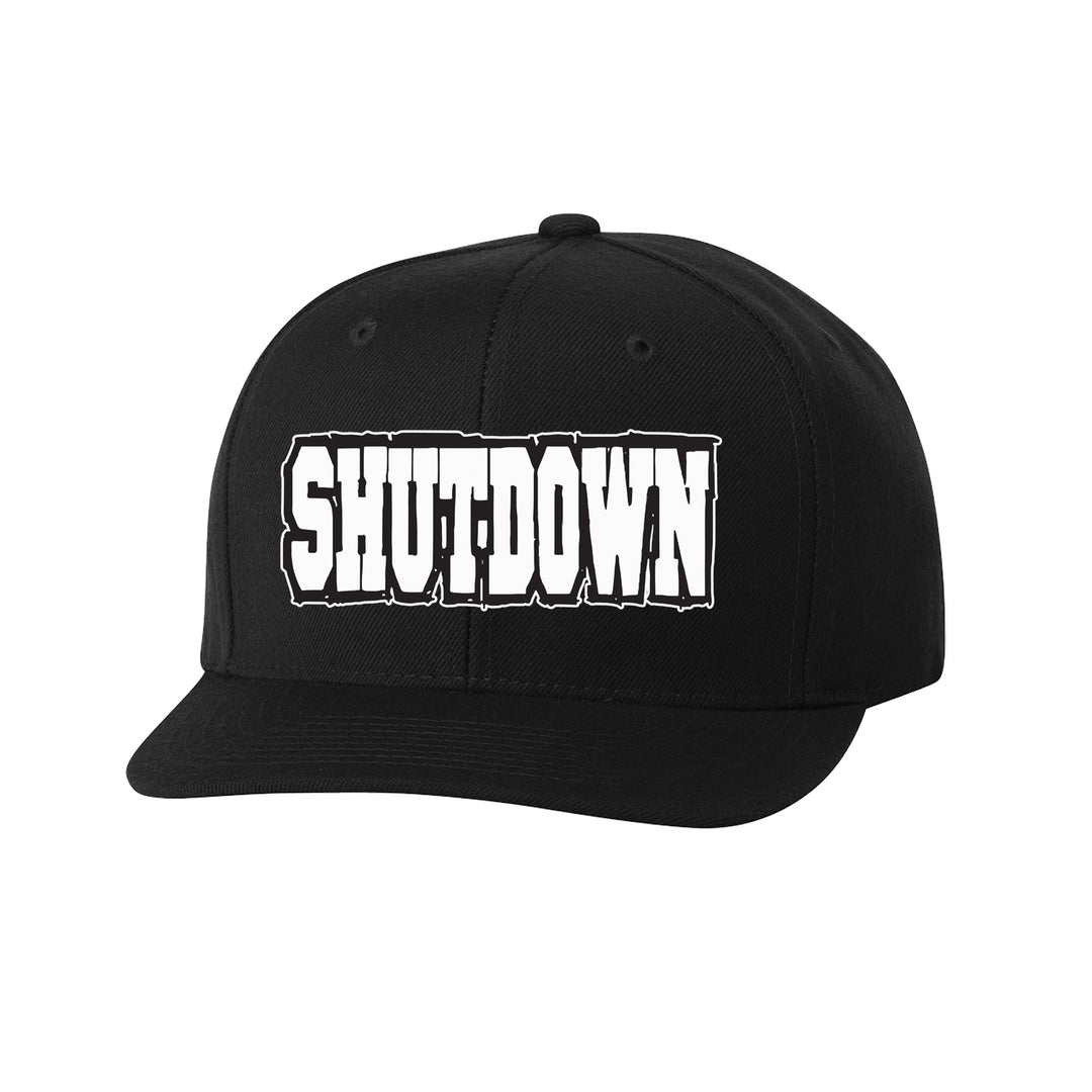 A black Shutdown snapback hat with the brand name in bold, white block letters on the front.