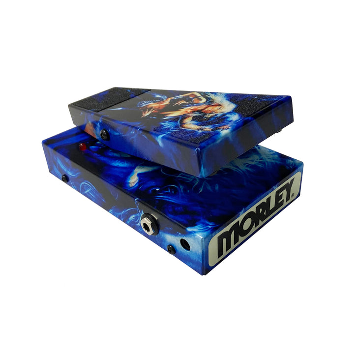 A Doro Custom Shop Limited Edition Wah Pedal with a vibrant blue design and illustrated character, shown angled to highlight its textured footplate, input jack, and the Doro brand name on the front.
