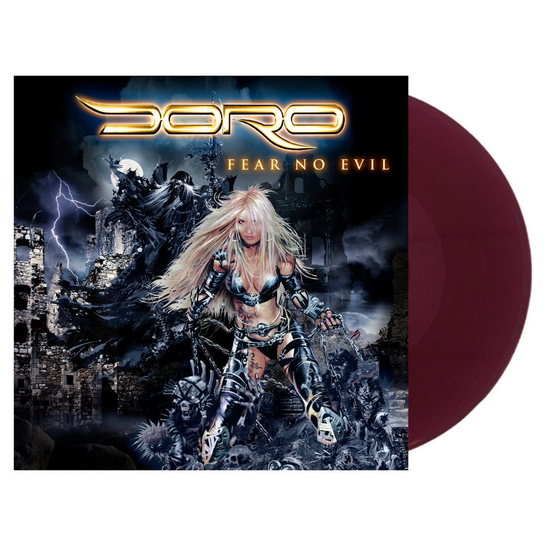 Album cover for Doro’s Fear No Evil shows a warrior woman in armor in a stormy, ruined landscape with lightning, echoing The Night Of The Warlock. The maroon vinyl record is partly visible behind the cover. Brand: Doro.