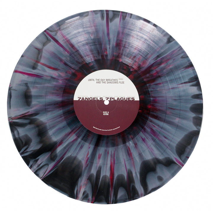 A black and gray marbled vinyl with purple splatter from 7 Angels 7 Plagues. The center label features the band name, song titles like "Until The Day Breathes," and side info printed above.