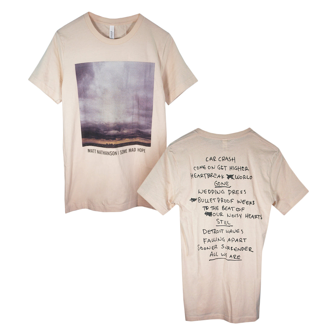 A beige Matt Nathanson t-shirt with an album cover and MATT NATHANSON | SOME MAD HOPE text on the front, plus a handwritten tracklist from the album printed on the back.