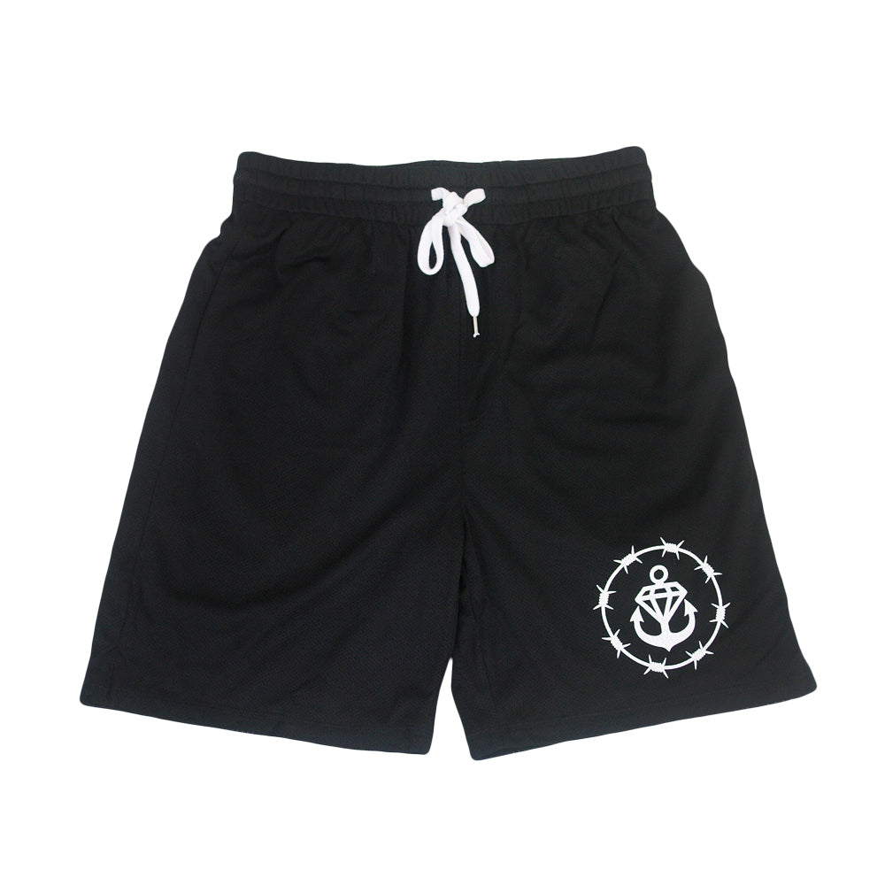 Stay Sick Clothing Black Court Shorts with a white drawstring and the Barbed Logo—an anchor encircled by barbed wire—on the left leg, shown laid flat on a white background.