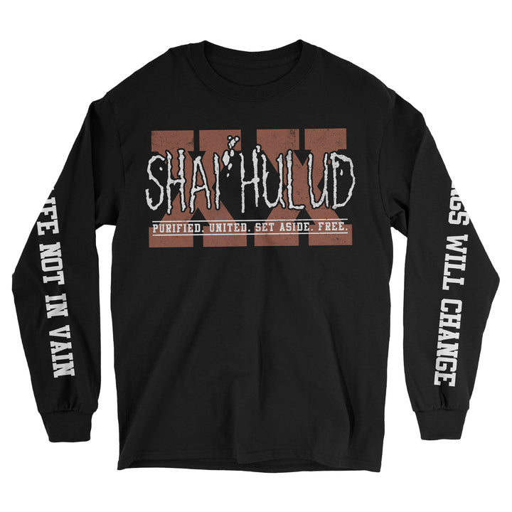 A black long-sleeve Shai Hulud Comfort Colors shirt with SHAI HULUD in bold, distressed white text and PURIFIED. UNITED. SET ASIDE. FREE. below; white sleeves read LIFE NOT IN VAIN and THINGS WILL CHANGE.