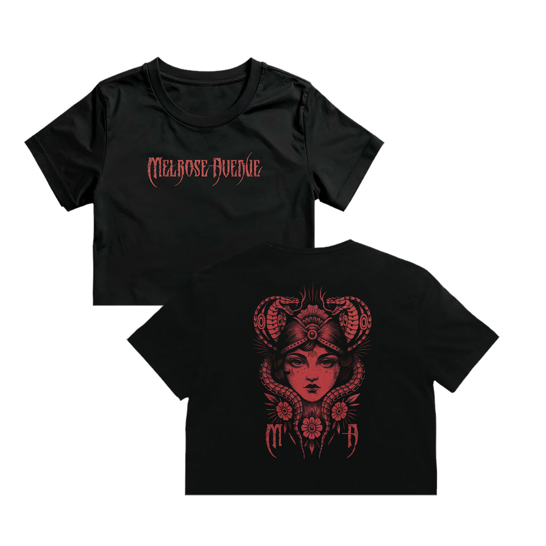 Melrose Avenue black crop tee in 100% combed cotton features “Melrose Avenue” in red Gothic font on the front and a detailed red graphic of a horned woman, flowers, and mystical symbols on the back. ASColour 4062.