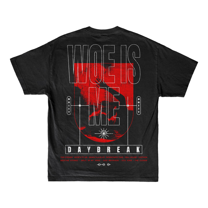Woe Is Me black t-shirt features bold white and red text over a striking red graphic. Daybreak appears in a white box with red accents and geometric lines for a modern touch.