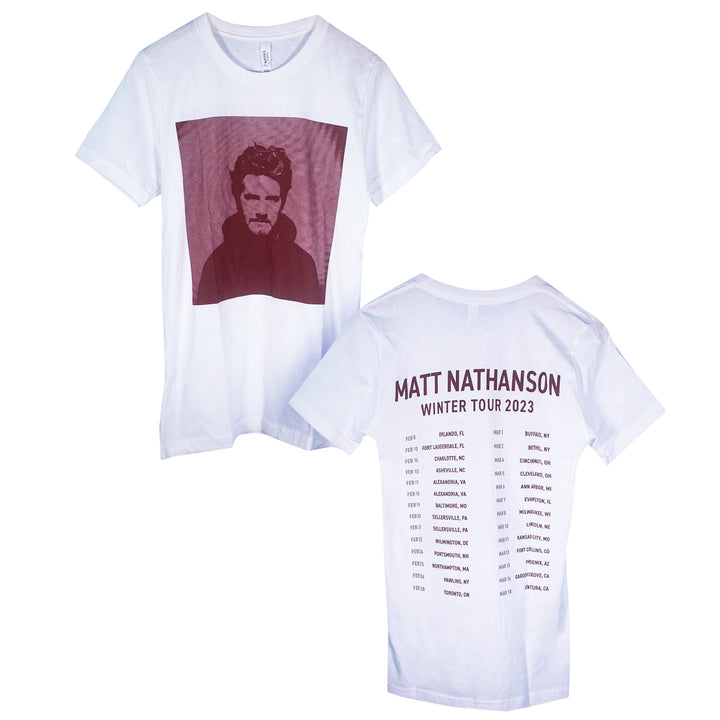 White Matt Nathanson shirt featuring a monochrome bearded man photo on the front. The back lists WINTER TOUR 2023 cities and dates—ideal for fans of music merch and lasting memories.