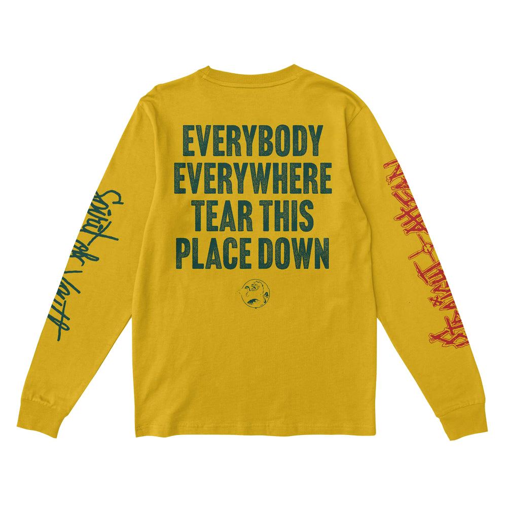 Straight Ahead yellow long-sleeve Comfort Colors shirt with bold black text "EVERYBODY EVERYWHERE TEAR THIS PLACE DOWN" on the back. Left sleeve features black cursive; right sleeve has red graffiti-style text. Presale available now.