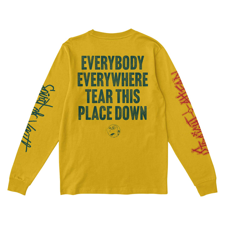 Straight Ahead yellow long-sleeve Comfort Colors shirt with bold black text "EVERYBODY EVERYWHERE TEAR THIS PLACE DOWN" on the back. Left sleeve features black cursive; right sleeve has red graffiti-style text. Presale available now.