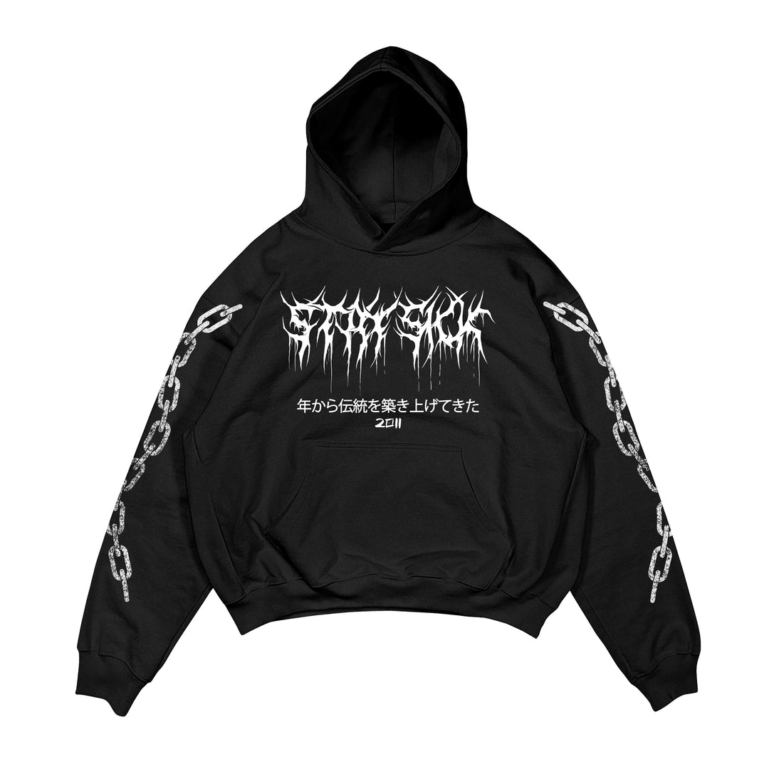 Stay Sick Clothing hoodie featuring bold white, jagged text on the chest, Japanese characters and "2011" below, plus chain graphics on both sleeves. High-quality print shown laid flat on a white background.