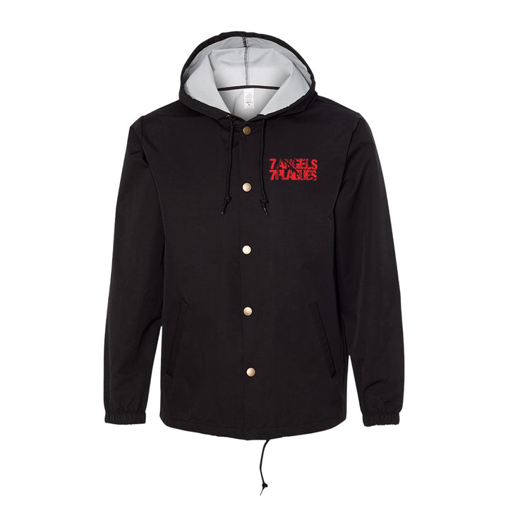 Black hooded coach’s jacket by 7 Angels 7 Plagues with gold buttons, front pockets, drawstring hem, water-resistant windbreaker fabric, light gray hood lining, and a red ZANIES N LAUGHS logo on the left chest.