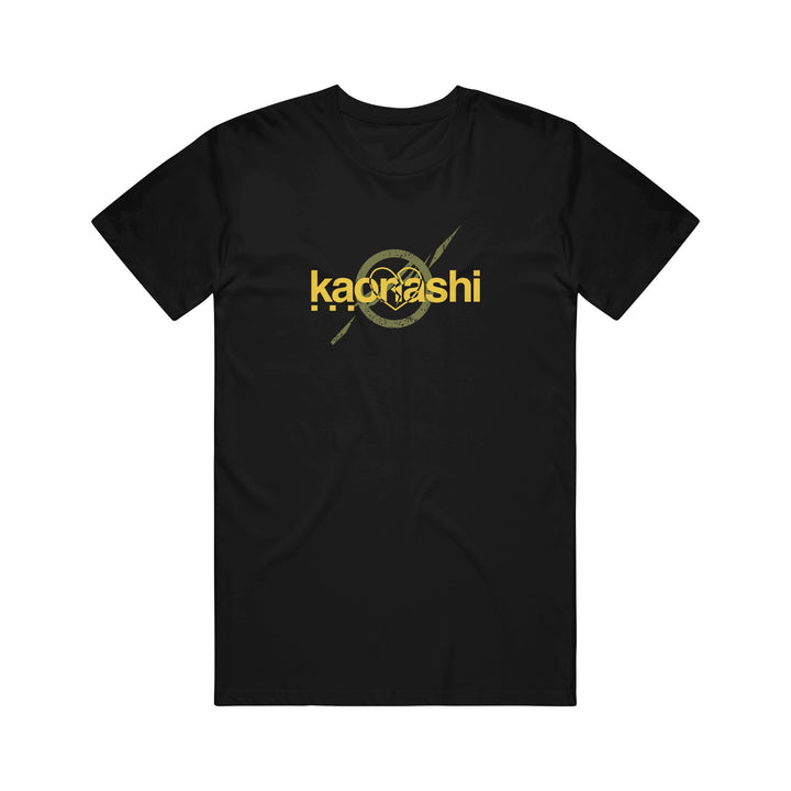 Black Kaonashi t-shirt featuring "kadrashi" in bold yellow letters and a stylized circular yellow graphic with diagonal lines, printed on the chest.