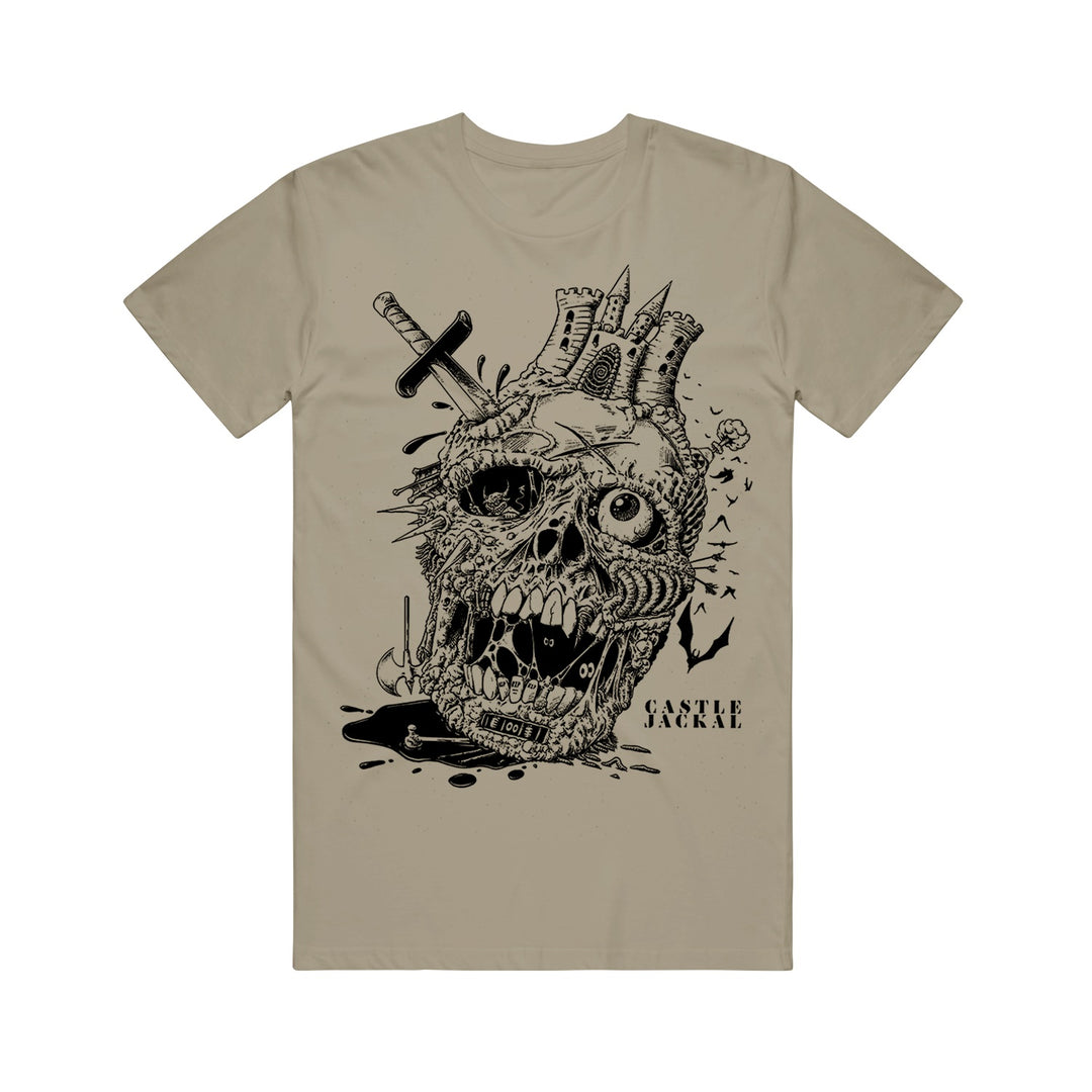Castle Jackal beige Comfort Colors tee with a bold “SACRIFICE” print, featuring a detailed decaying skull, castle on top, sword through the eye, dripping black ink, and flying bats.