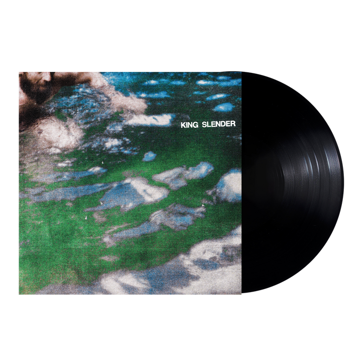 A 12” vinyl record partially slides out from its cover, which shows a blurry photo of someone swimming in greenish water with white spots. The brand name, King Slender, appears in white text on the cover.