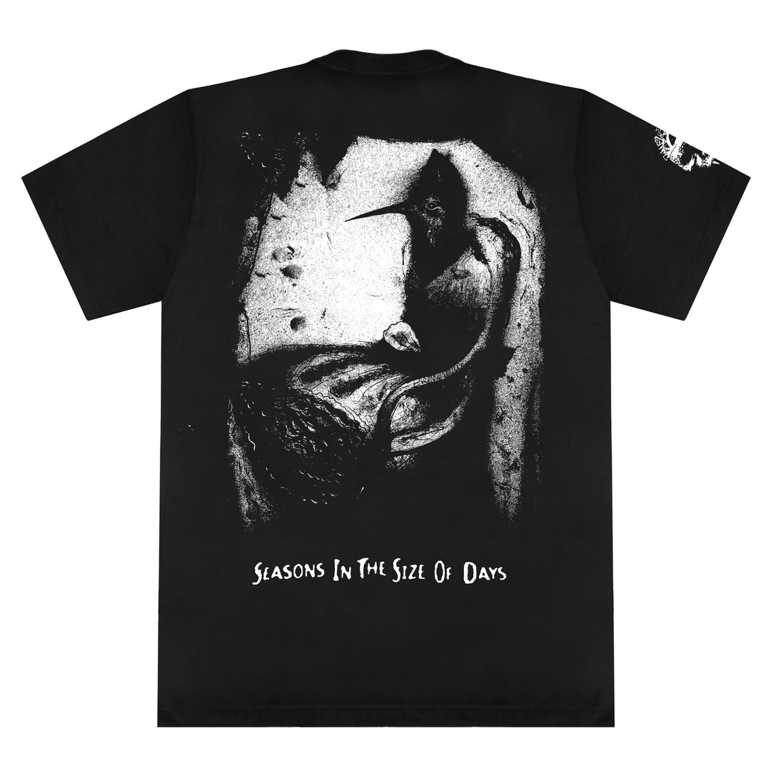 Black Integrity Heavy Cotton T-shirt with a grayscale abstract design of organic shapes on the back and SEASONS IN THE SIZE OF DAYS in white at the bottom. Durable print ensures lasting comfort and style.