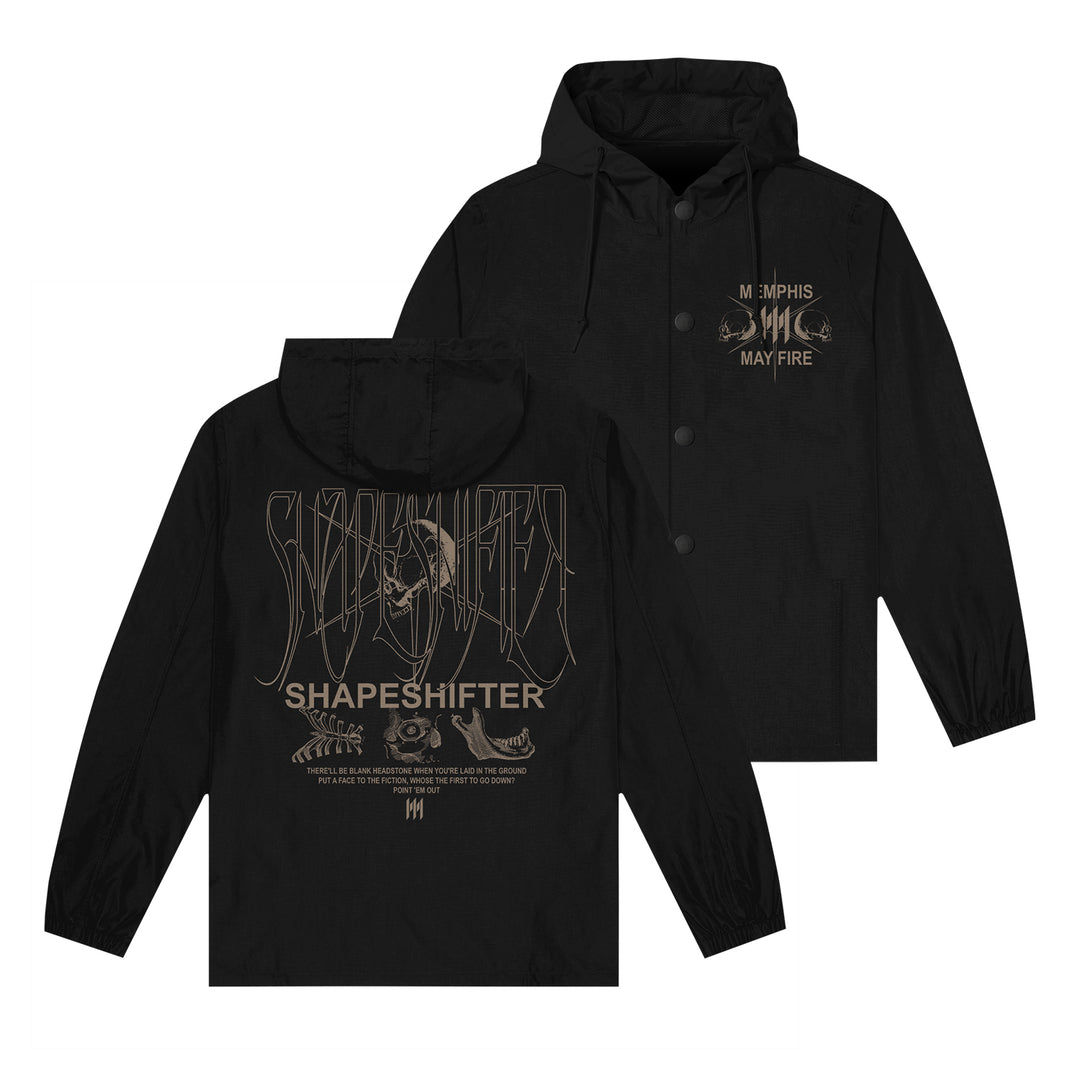 Memphis May Fire black windbreaker featuring "Shapeshifter" artwork—snake, leaves, geometric lines—on the back; front shows band name and a small flame graphic.