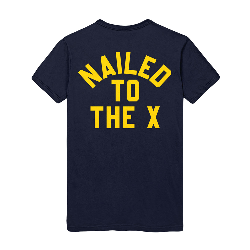 The Bold Navy T-Shirt features striking yellow "NAILED TO THE X" text in all caps on the back, making a statement wherever you go.