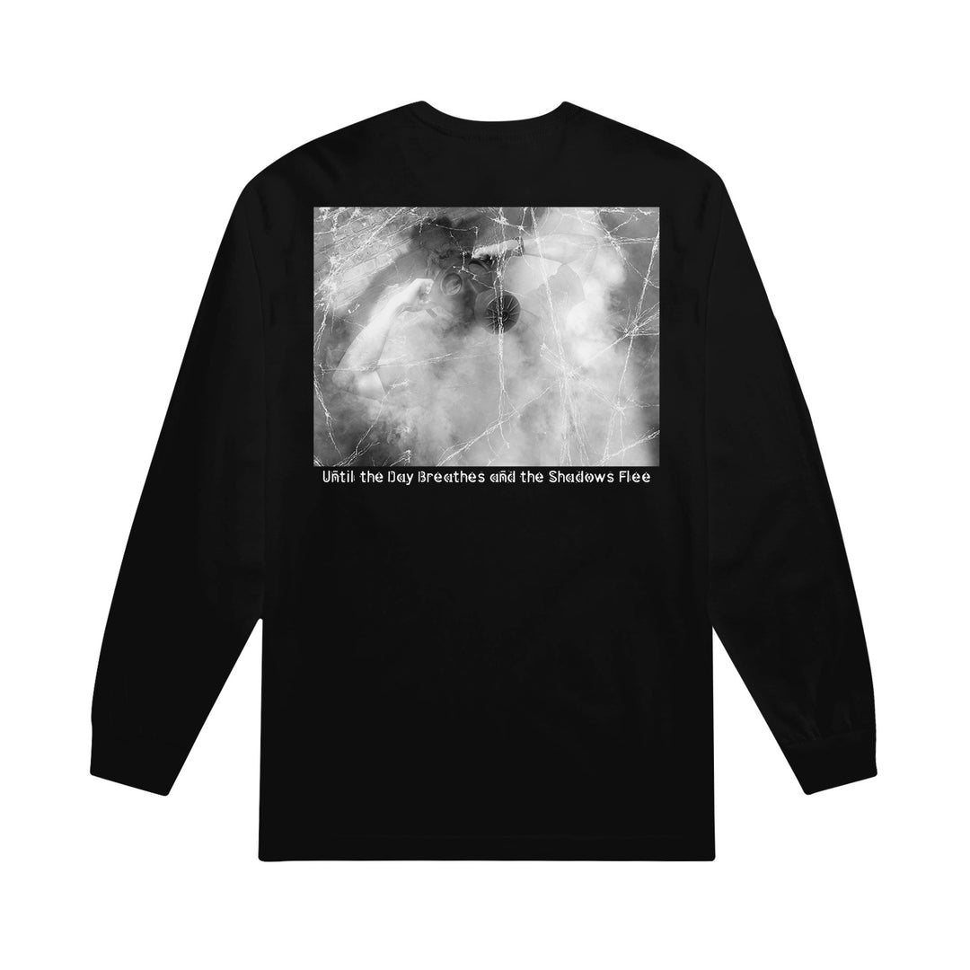 A black 7 Angels 7 Plagues long-sleeve shirt (Style 1304) with a grayscale abstract image on the back and "Until the Day Breathes and the Shadows Flee" printed below.