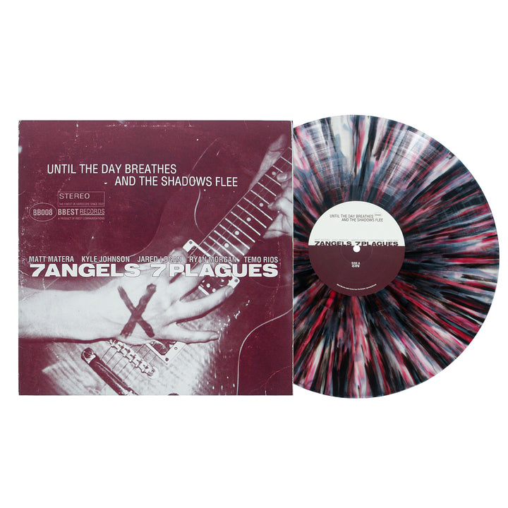 A black, white, and pink splatter marbled vinyl by 7 Angels 7 Plagues sits next to its album cover featuring a guitarist’s hand with an X and the title “Until The Day Breathes and the Shadows Flee.”.