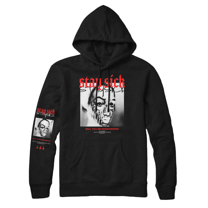 A black pullover hoodie from Stay Sick Clothing featuring a face with hands graphic, red Stay Sick text on the chest, and bold “Will You Be Remembered” text with red and white graphics on the sleeve and front.