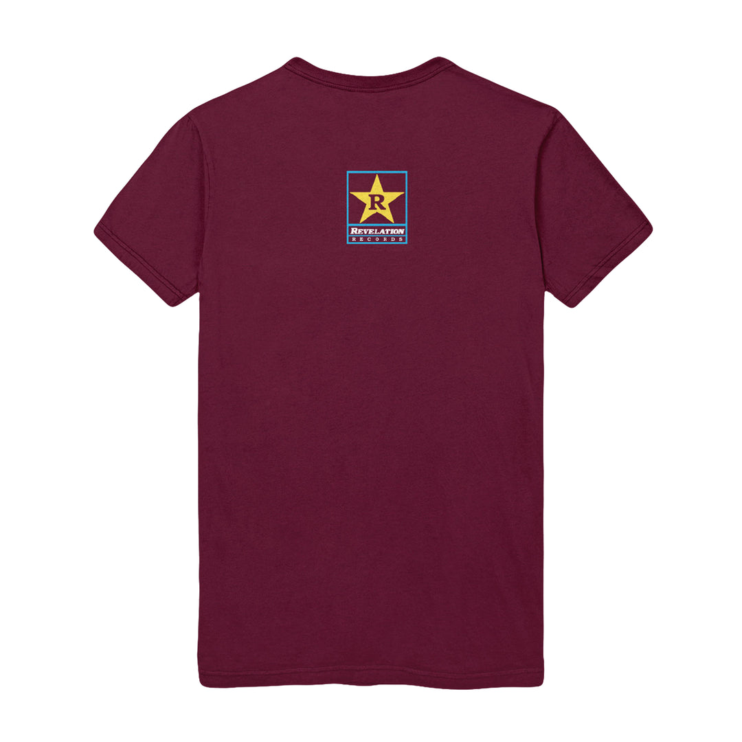 A maroon Bold short-sleeve T-shirt with a small rectangular logo on the upper back showing a yellow star, the letter R above "REVOLUTION," and additional smaller text underneath.