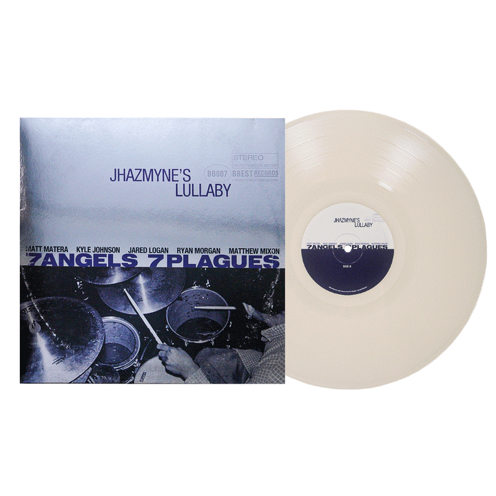 A vinyl record and its cover. The cover says Jhazmynes Lullaby by 7 Angels 7 Plagues and shows a drummer playing. This Limited Edition, 25th Anniversary Edition features a light, opaque Glow in the Dark Vinyl with a center label matching the album cover design.