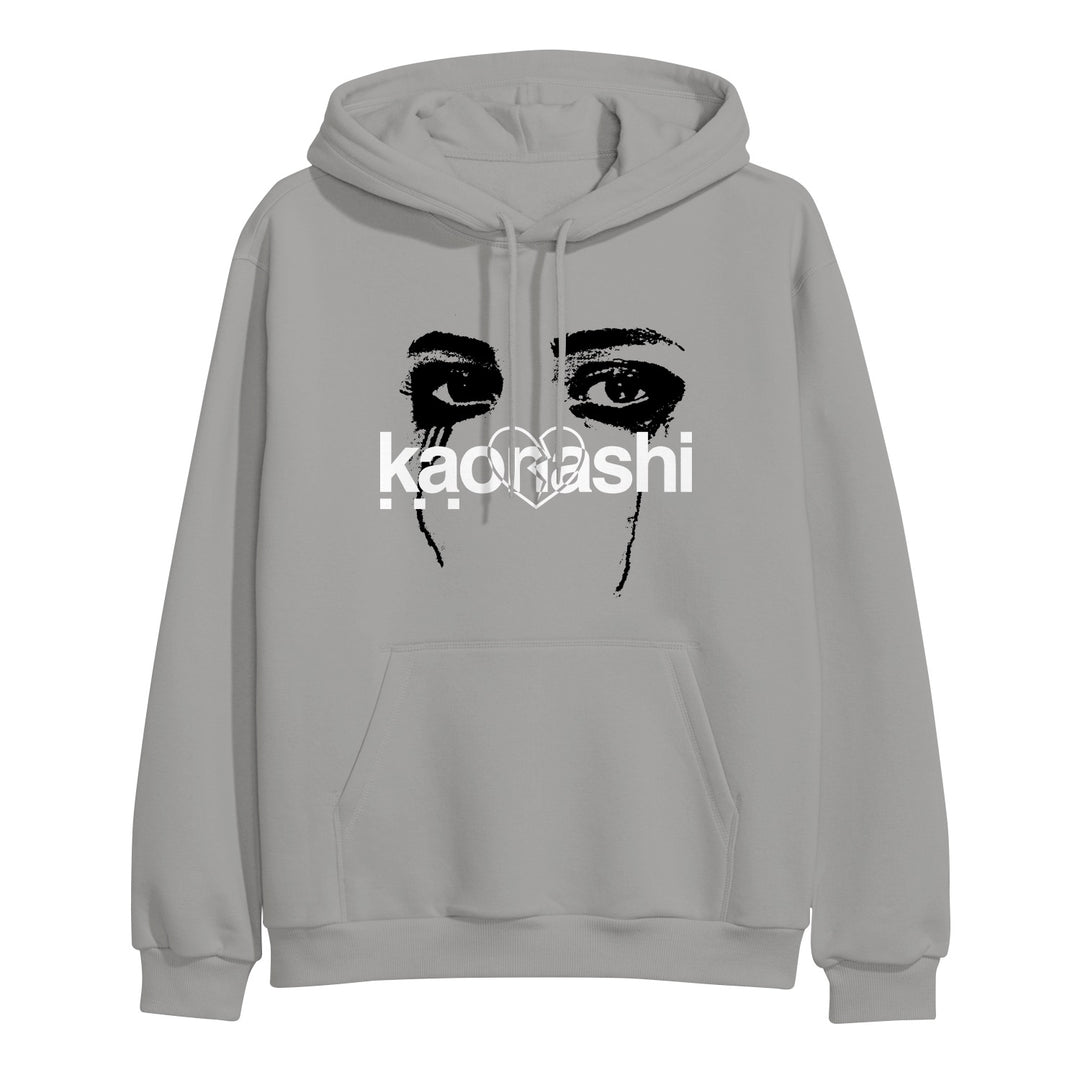 Light gray Kaonashi pullover hoodie with a black and white graphic of intense eyes and eyebrows above "kaonashi" in bold, stylized white text across the chest.