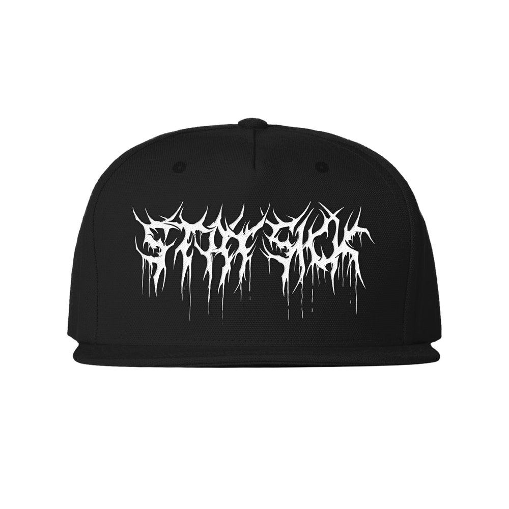 A black flat-bill cap from Stay Sick Clothing, featuring bold, dripping white STAYCOLD lettering on the front in a metal band style. Available in Medium Large Fit for comfortable wear.