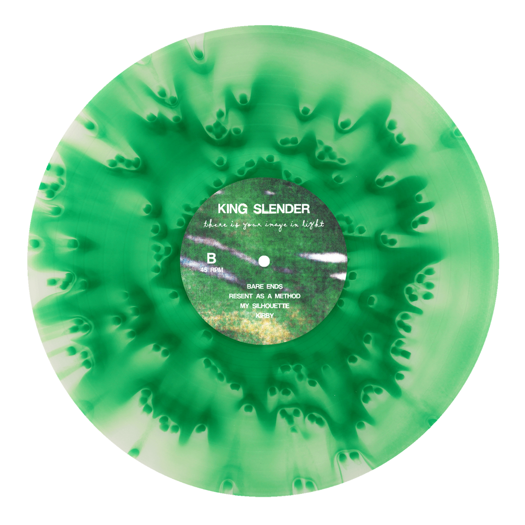A green and white marbled vinyl from King Slender, an emotional hardcore band, with track titles and album text in white and light blue on the center label.