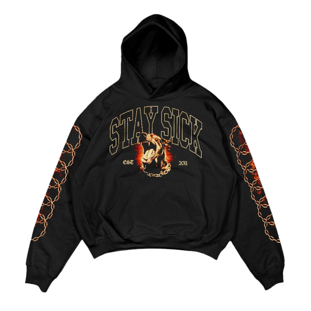 Stay Sick Clothing presents a premium black hoodie featuring STAY SICK in bold beige letters, a snarling Dog Head graphic, and orange chain sleeve designs.