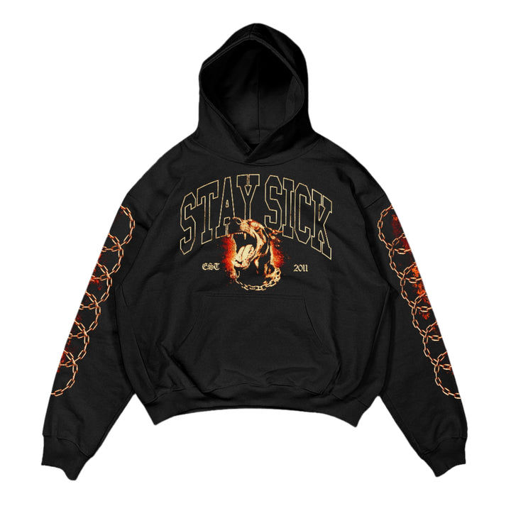 Stay Sick Clothing presents a premium black hoodie featuring STAY SICK in bold beige letters, a snarling Dog Head graphic, and orange chain sleeve designs.