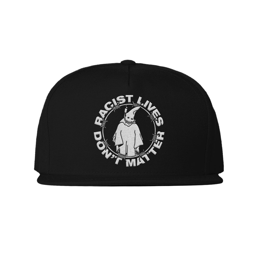 The Stay Sick Clothing Black Snapback Hat showcases a goat in a hood and robes, boldly surrounded by the phrase “Racist Lives Don’t Matter” in striking white lettering.