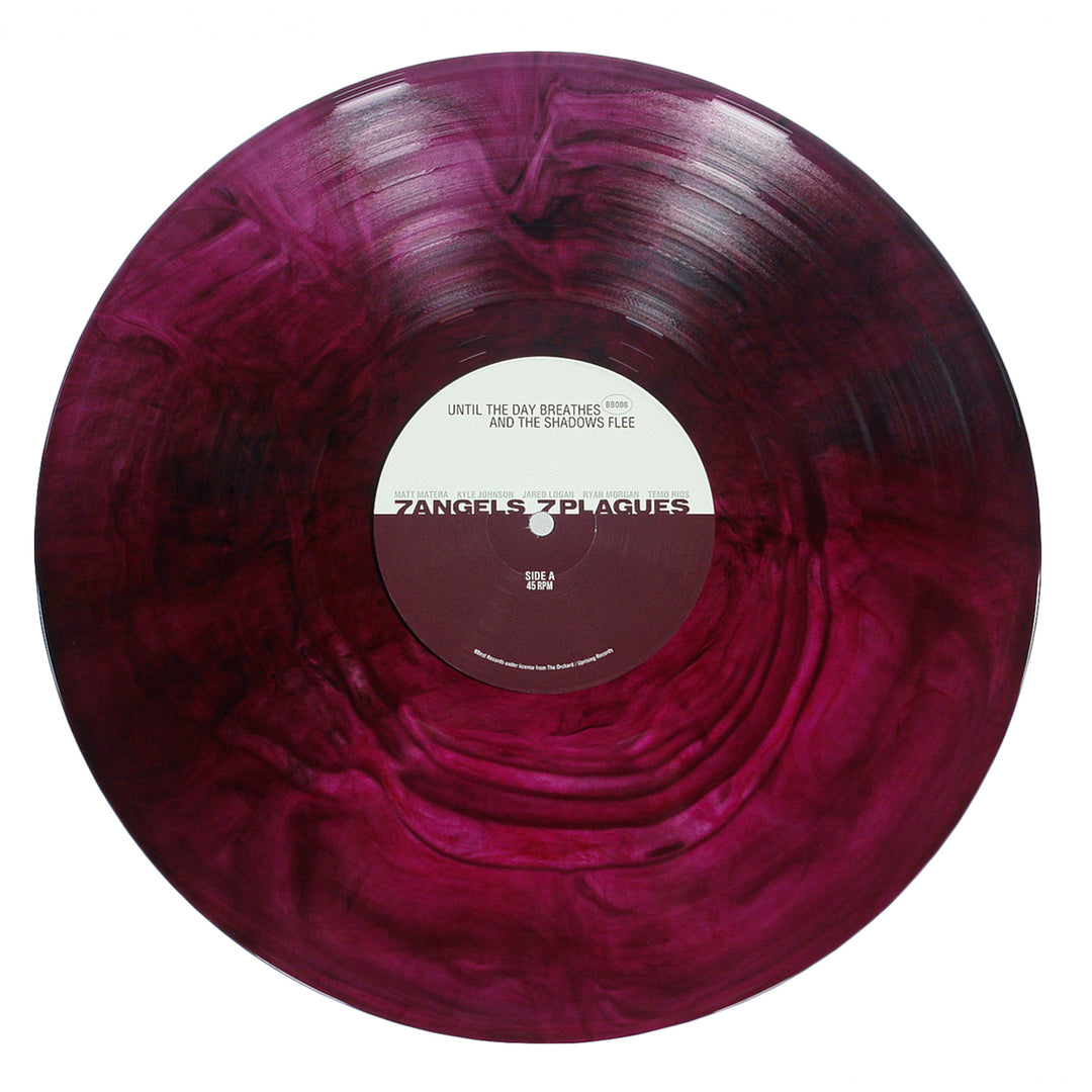 A marbled purple swirl vinyl record by 7 Angels 7 Plagues features swirling pink and dark purple patterns, with a white center label displaying the band name and track details—reflecting the mood of "Until The Day Breathes and the Shadows Flee.