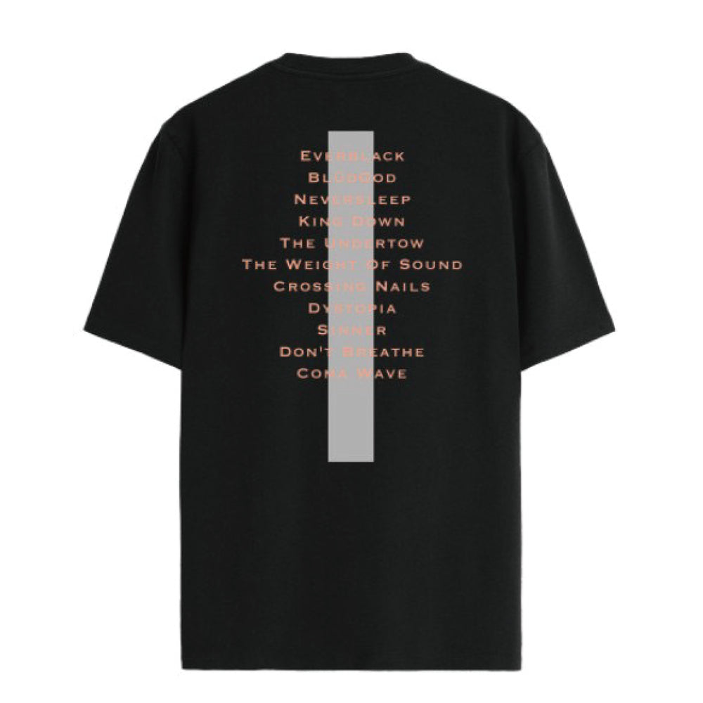 Black Crystal Lake T-shirt (style 2000) shown from the back with a vertical gray stripe and a list of orange song titles printed down the center. Features short sleeves, relaxed fit, and showcases quality printed garments.