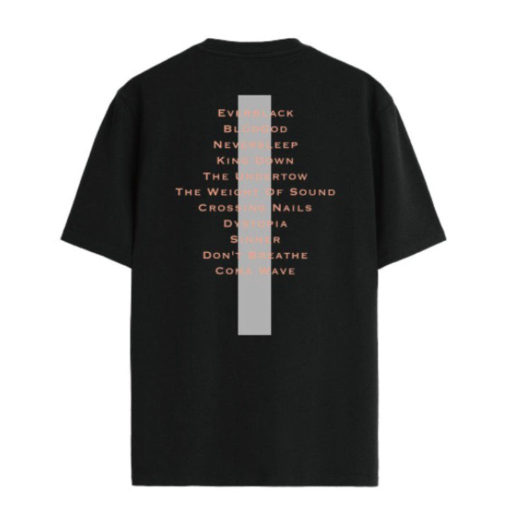 Black Crystal Lake T-shirt (style 2000) shown from the back with a vertical gray stripe and a list of orange song titles printed down the center. Features short sleeves, relaxed fit, and showcases quality printed garments.