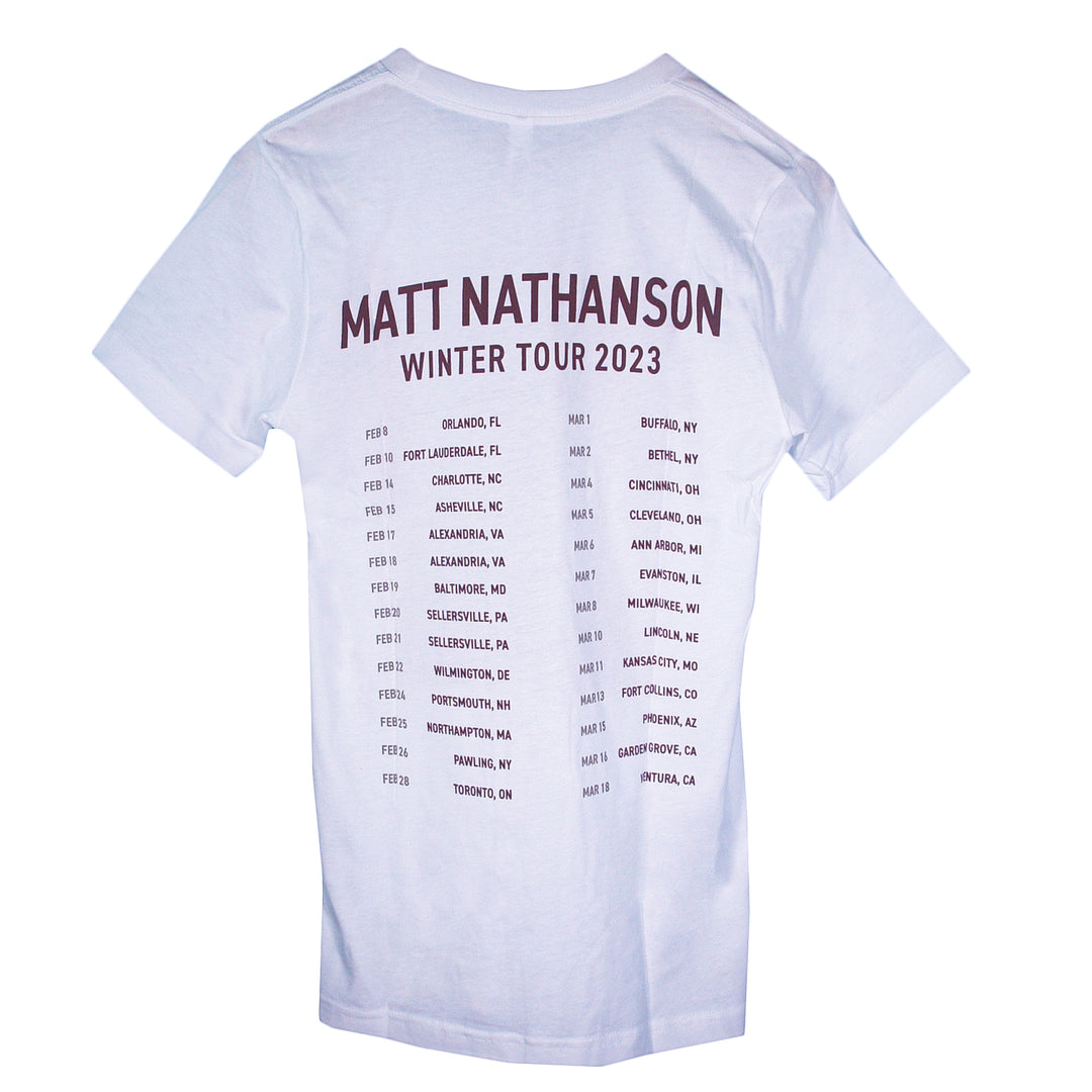 Matt Nathanson white Bella + Canvas T-Shirt featuring Winter Tour 2023 in large text on the back, plus tour dates and cities in two columns. A must-have for fans who love stylish branded tees.