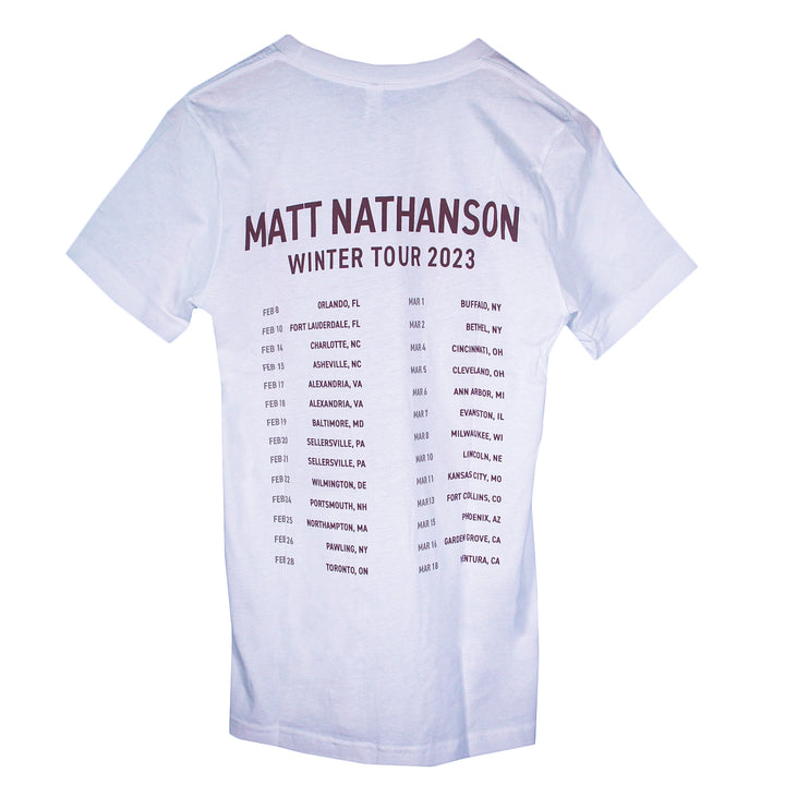 Matt Nathanson white Bella + Canvas T-Shirt featuring Winter Tour 2023 in large text on the back, plus tour dates and cities in two columns. A must-have for fans who love stylish branded tees.