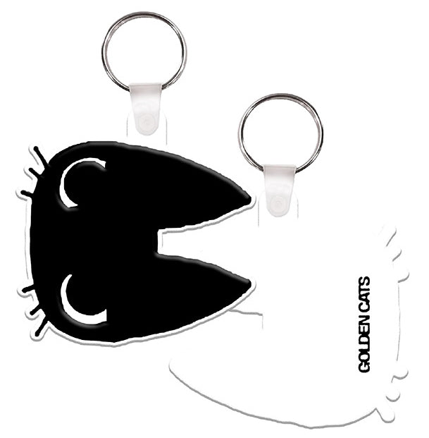 Two cat-shaped key rings: one black cat with white eyes and one white keychain with the text GOLDEN CATS printed on it.