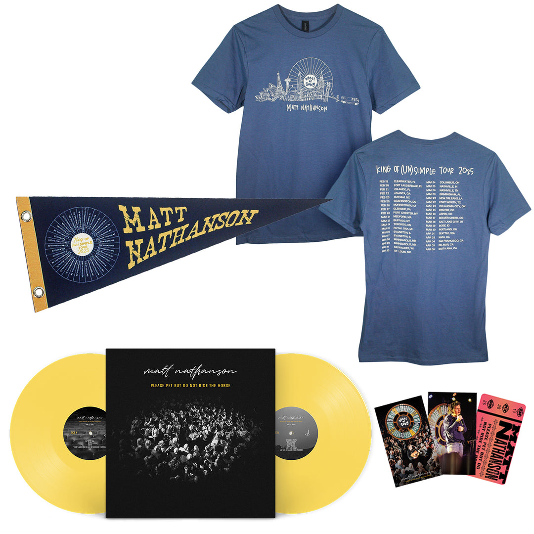 A collection of Matt Nathanson memorabilia displayed together, including a blue tour T-shirt, blue and yellow pennant, limited edition Lemon Yellow Vinyl records, an album cover, Holographic Tickets, and other tour items.