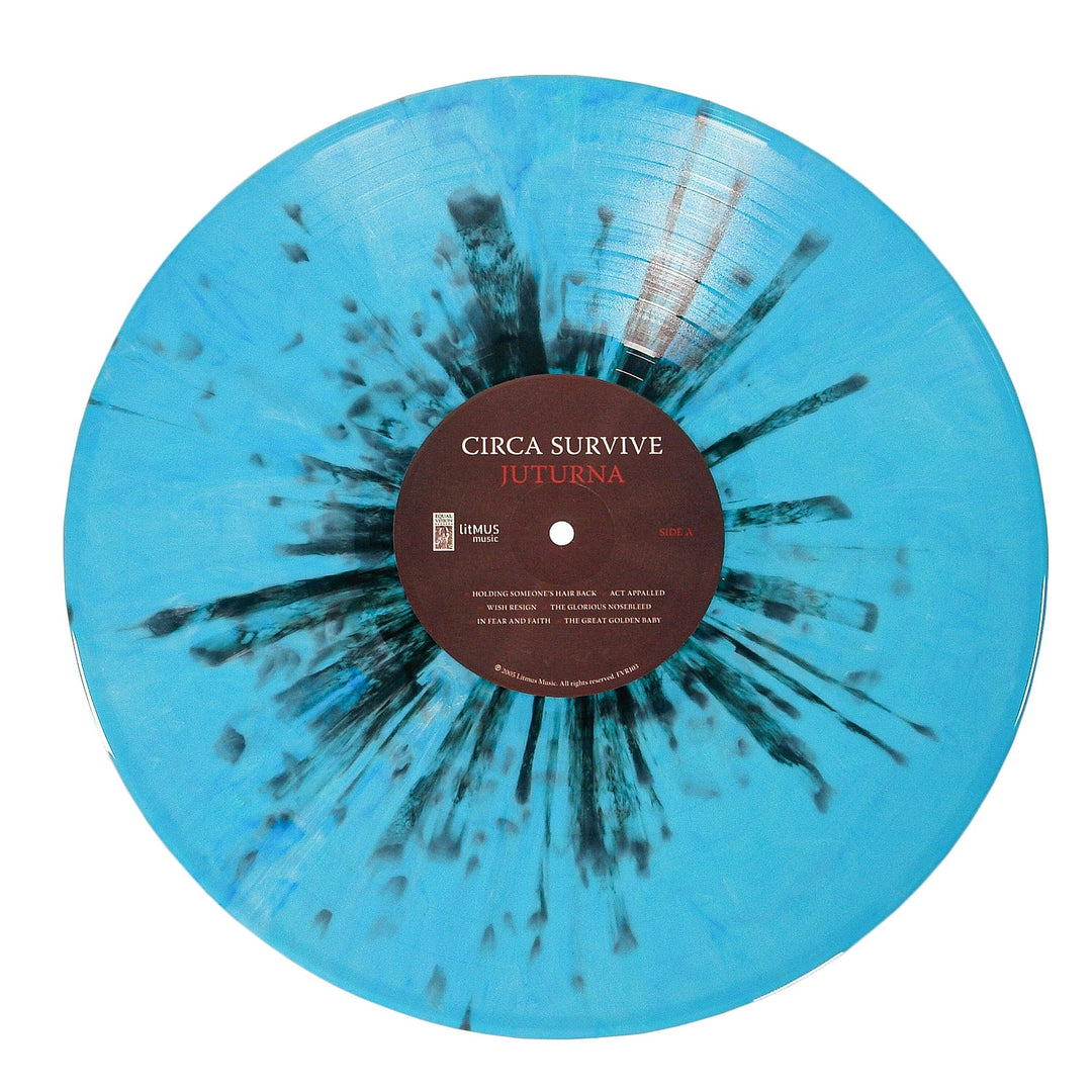 This limited edition Circa Survive Juturna vinyl features a pale blue and black splatter with radiating patterns and a dark brown label—an eye-catching piece for collectors.