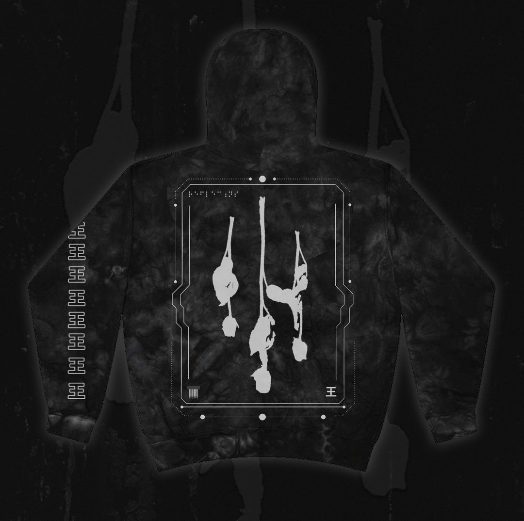 Reflections black hoodie featuring white abstract vertical paint streaks and a geometric border design on the back, with “Crystal Eyes” symbols running along one sleeve, all set against a dark, textured background.