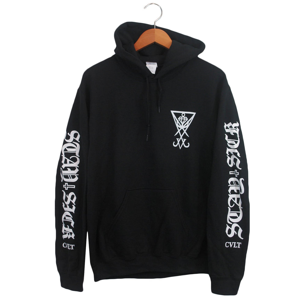A black Stay Sick Clothing hoodie with white graphics: a geometric symbol on the chest, IN DIST HORDS down both sleeves, and CVLT near the left wrist, displayed on a wooden hanger.