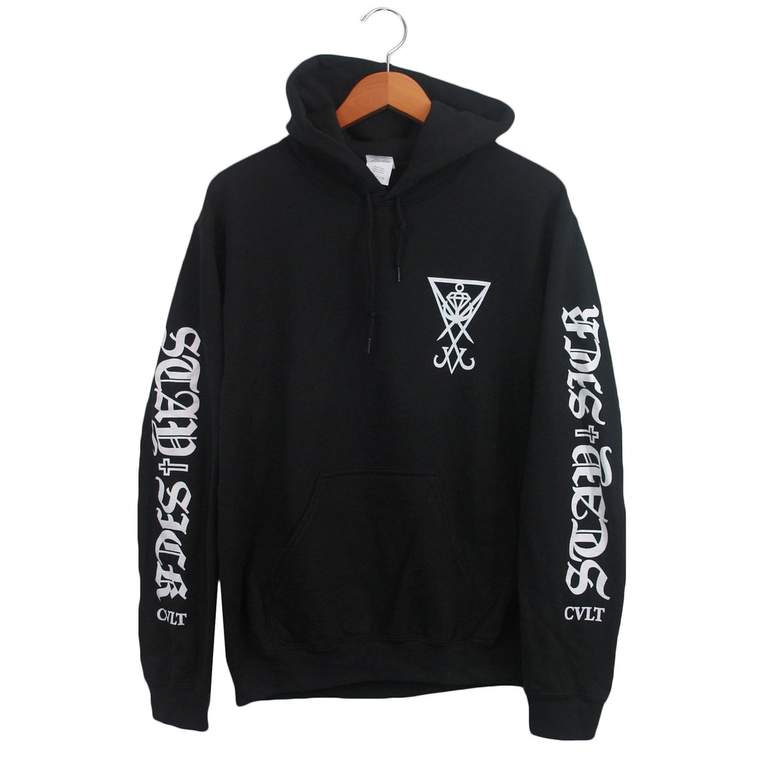 A black Stay Sick Clothing hoodie with white graphics: a geometric symbol on the chest, IN DIST HORDS down both sleeves, and CVLT near the left wrist, displayed on a wooden hanger.
